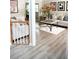 Bright living room boasts hardwood floors, neutral paint, and modern furniture at 9130 Charlton Pl, Douglasville, GA 30135