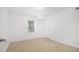 Bright bedroom with hardwood floors, a window and closet door at 2358 Armand Ne Rd, Atlanta, GA 30324