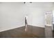 Bedroom with hardwood floors and access to a bathroom through a barn door at 2358 Armand Ne Rd, Atlanta, GA 30324