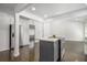 Bright open kitchen with a center island, stainless steel appliances, and hardwood floors at 2358 Armand Ne Rd, Atlanta, GA 30324