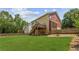 Large backyard featuring a lush lawn and wooden deck, great for outdoor living at 2667 Hampton Park Dr, Marietta, GA 30062
