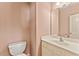 Powder room with a white vanity and ample lighting at 2667 Hampton Park Dr, Marietta, GA 30062