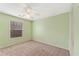 Bedroom with neutral carpet and a bright, light green paint at 2667 Hampton Park Dr, Marietta, GA 30062