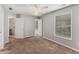 Spacious bedroom featuring a ceiling fan, window, and plush carpeting at 2667 Hampton Park Dr, Marietta, GA 30062