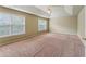 Spacious primary bedroom with large windows and a ceiling fan at 2667 Hampton Park Dr, Marietta, GA 30062