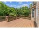 Spacious wooden deck overlooking lush greenery, perfect for outdoor enjoyment and relaxation at 2667 Hampton Park Dr, Marietta, GA 30062