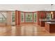 Eat-in kitchen space featuring wood cabinets, granite counters, hardwood floors, and natural light at 2667 Hampton Park Dr, Marietta, GA 30062