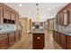 Open kitchen and living space with wood cabinets, a center island, and easy flow for entertaining at 2667 Hampton Park Dr, Marietta, GA 30062