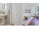 Bathroom with decorative sink and view into bedroom with stylish furniture at 2800 Mornington Nw Dr, Atlanta, GA 30327