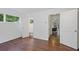 Bedroom with hardwood floors and view to an ensuite bathroom and living room at 2800 Mornington Nw Dr, Atlanta, GA 30327