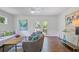 Bright living room with hardwood floors, French doors to the backyard, and modern decor at 2800 Mornington Nw Dr, Atlanta, GA 30327