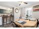 Dining room with updated lighting and flooring, with a partial view into the kitchen at 3251 Abbeywood Dr, Decatur, GA 30034