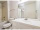 Bathroom featuring white vanity, large mirror, tub with shower, and views to the bedroom at 4895 Ozment Ridge Ct, Lithonia, GA 30038