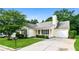 Charming one-story home featuring a well-manicured lawn and inviting curb appeal at 4895 Ozment Ridge Ct, Lithonia, GA 30038