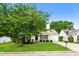 Charming single-Gathering home with a well-manicured lawn and a lovely shade tree at 4895 Ozment Ridge Ct, Lithonia, GA 30038