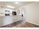 Modern kitchen with white cabinets, modern appliances, and lots of lighting at 4895 Ozment Ridge Ct, Lithonia, GA 30038