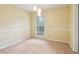 Cozy dining room with modern lighting and a large window, ideal for Gathering meals and gatherings at 763 Brookwood Sw Ter, Lilburn, GA 30047