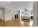 Spacious main bedroom featuring hardwood floors, ceiling fan, and bright windows at 1020 Austin Ne Ave, Atlanta, GA 30307