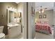 Bathroom leading to a main bedroom, showcasing a tiled floor at 4874 Registry Nw Ln, Kennesaw, GA 30152