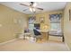 Bedroom featuring neutral walls, an office desk, and natural lighting at 4874 Registry Nw Ln, Kennesaw, GA 30152