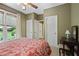 Bedroom with neutral paint, ceiling fan, and natural light at 4874 Registry Nw Ln, Kennesaw, GA 30152