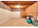 Unfinished basement shows exposed ceiling beams and a concrete foundation, offering potential for customization at 1123 Willow Trce, Grayson, GA 30017