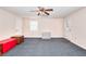Finished basement with neutral carpet, white trim, and a door leading to the outside at 1123 Willow Trce, Grayson, GA 30017