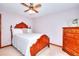Bedroom featuring carpet, ceiling fan, wooden dresser at 1123 Willow Trce, Grayson, GA 30017