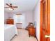 Bedroom with neutral walls, carpet, and a wooden dresser at 1123 Willow Trce, Grayson, GA 30017