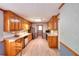 Spacious kitchen showcasing wood cabinets, modern appliances, and ample counter space at 1123 Willow Trce, Grayson, GA 30017