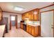 Charming kitchen featuring wood cabinetry, black appliances, and a light, airy feel at 1123 Willow Trce, Grayson, GA 30017