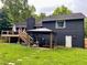 Exterior view of backyard, gazebo, and deck, showcasing the property's outdoor space at 124 Dockside Downs Dr, Woodstock, GA 30189