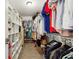 Spacious walk-in closet with ample shelving, hanging space, and organized storage solutions at 1600 Belle Isle Ne Cir, Atlanta, GA 30329