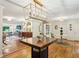 Dining area with a view to the adjacent living room space at 1600 Belle Isle Ne Cir, Atlanta, GA 30329