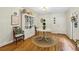 Dining area with white decor, hardwood floors and a back door at 1600 Belle Isle Ne Cir, Atlanta, GA 30329