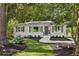 Charming front yard with landscaped garden and well-maintained lawn at 1600 Belle Isle Ne Cir, Atlanta, GA 30329
