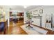 Living room showcasing hardwood floors, decorative fireplace, and an open transition to the kitchen space at 1600 Belle Isle Ne Cir, Atlanta, GA 30329