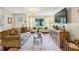 Bright and inviting living room with large window, stylish furniture, and an open, airy layout at 1600 Belle Isle Ne Cir, Atlanta, GA 30329