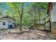 Exterior view of a detached shed structure with adjacent blue trash container at 239 Haas Se Ave, Atlanta, GA 30316
