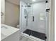 Modern bathroom with a glass enclosed shower and subway tile, paired with a sleek vanity at 2489 Smith Ave, Marietta, GA 30064