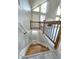Staircase with wood and metal railings leading to the lower level at 2489 Smith Ave, Marietta, GA 30064
