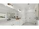 Modern bathroom with double sinks, walk-in shower, and stylish finishes with lots of natural light at 635 Opera Ln, Alpharetta, GA 30009