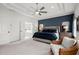 Primary bedroom features a bed, with view to the ensuite bath at 635 Opera Ln, Alpharetta, GA 30009