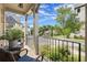 Relaxing porch with comfortable seating, perfect for enjoying the neighborhood views at 635 Opera Ln, Alpharetta, GA 30009