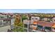 An aerial view of townhomes with roof top decks, brick accents, and copper roofs at 1199 Huff Nw Rd # 112, Atlanta, GA 30318