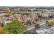 Aerial view showcasing the urban condo community, lush landscaping, and neighborhood streets at 1199 Huff Nw Rd # 112, Atlanta, GA 30318