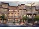 Beautiful multi-story brick building with large windows and wrought iron details at 1199 Huff Nw Rd # 112, Atlanta, GA 30318
