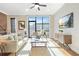 Bright living room with hardwood floors, a large window, and contemporary furnishings at 1199 Huff Nw Rd # 112, Atlanta, GA 30318