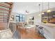 Bright open-plan living space features hardwood floors, large windows, and contemporary furnishings at 1199 Huff Nw Rd # 112, Atlanta, GA 30318