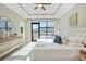 Bright and airy bedroom with a large window, plush bedding, and stylish decor at 1199 Huff Nw Rd # 112, Atlanta, GA 30318